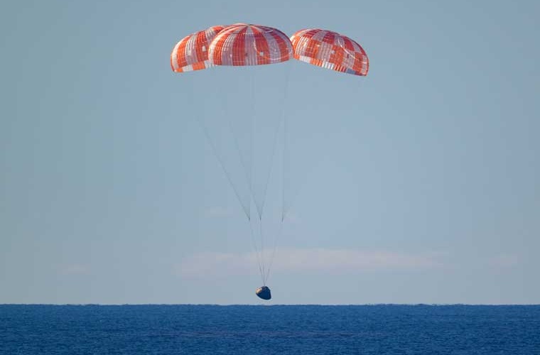 NASA’s Orion spacecraft with Artemis II crewmembers NASA astronauts Reid Wiseman, commander; Victor Glover, pilot; Christina Koch, mission specialist; and CSA (Canadian Space Agency) astronaut Jeremy Hansen, mission specialist aboard was seen as it splashed down at 5:07 p.m. PDT in the Pacific Ocean off the coast of California, Friday, April 10, 2026. NASA’s Artemis II mission took Wiseman, Glover, Koch, and Hansen on a 10-day journey around the Moon and back to Earth.