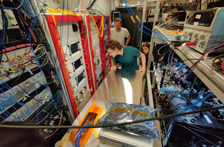The system that will enable the future control of an array of 2,000 individually addressable laser beams is delivered to the laboratory in an unassuming enclosure and integrated into the existing experiment.