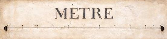 Standardmeter aus Marmor an einer Häuserwand in Paris