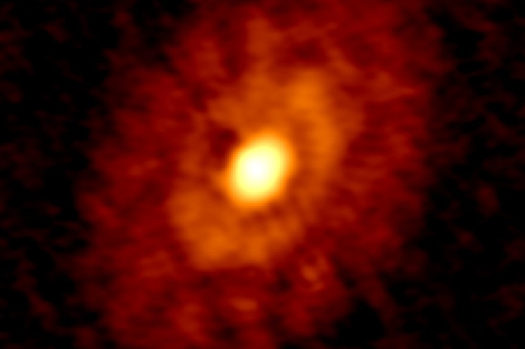 Abb.: ALMA-Bild der jungen Staubringe, in denen Planeten entstehen, um den...